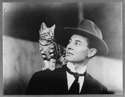 Aviator John B. Moisant, probably with his feline frequent flying companion, Mademoiselle Fifi. From Flickr Commons Project.